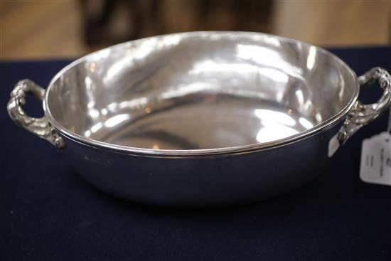 A William IV oval two handled silver vegetable tureen and liner by R & S Garrard & Co, 44 oz.